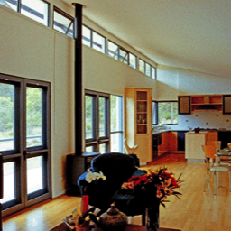 Living areas oriented to north, clearstorey lights, insulated cavity walls.